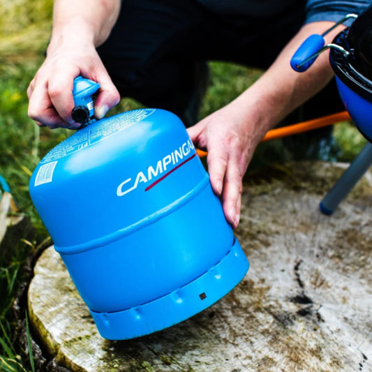 Campingaz cylinder attached to a camping barbecue