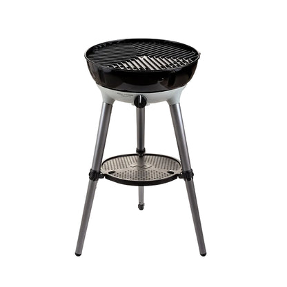 Portable grill with a black grilling surface and metal stand on a white background