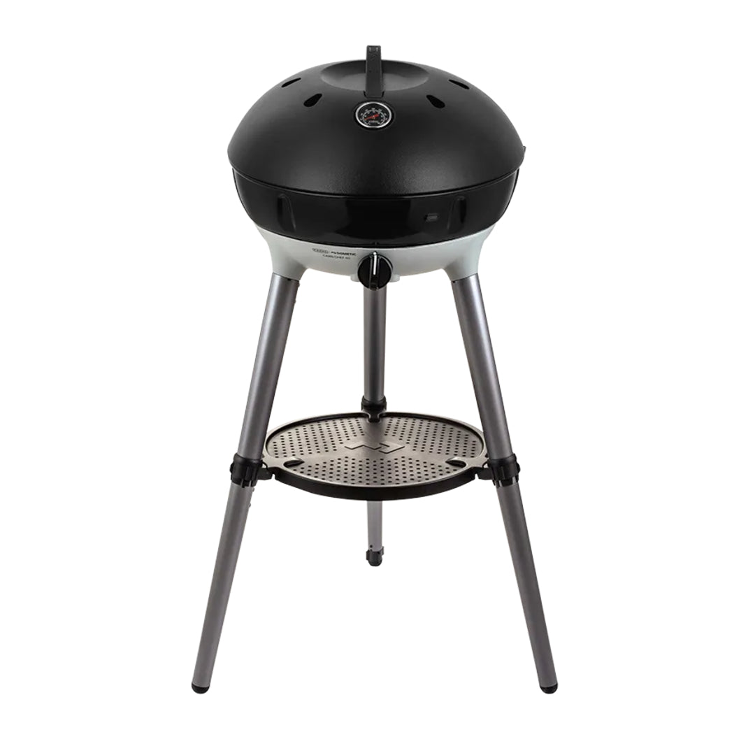 Black portable grill on a white background